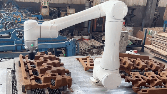 milan.米兰中国缸盖砂芯自动修芯机器人